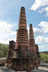 Old brick pipes of factory in Ruskeala, Karelia republic, Russia