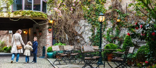 Tableau sur plexiglas Bruges Mother and kids outdoors in Belgium  © TravelPhotoBloggers