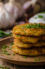 Potato pancakes with sour cream