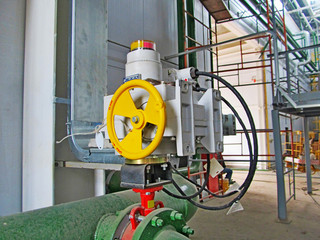Electric gate on the technological pipe.