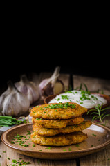 Potato pancakes with sour cream