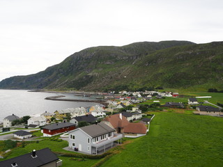 Fototapeta na wymiar View of the village from Alnes ligthhouse, Godøya, Giske, Norway