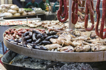 Meat, spanish food in Medieval market.
