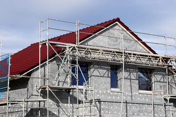 Wohnhaus mit professioneller Fassadend&auml;mmung / W&auml;rmed&auml;mmung