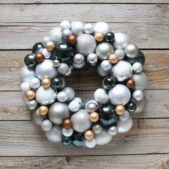 Christmas wreath on wooden background