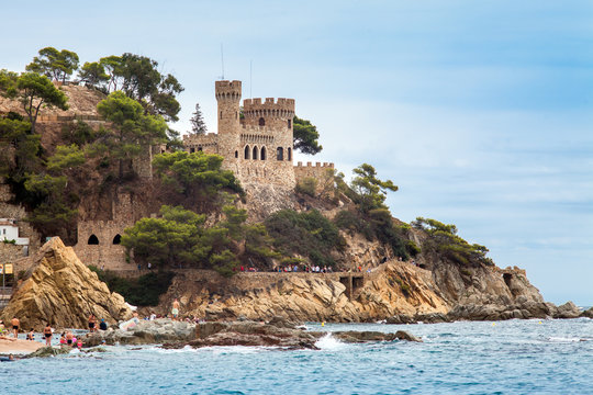 Castell d'en Plaja on the Costa Brava in Lloret de Mar, Spain. View of the Balearic Sea and the rocky coast. Popular tourist destination in Spain.