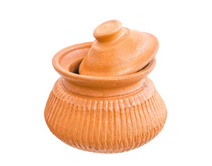 Closeup shot of handmade earthenware pot with cover on from clay on white isolated.