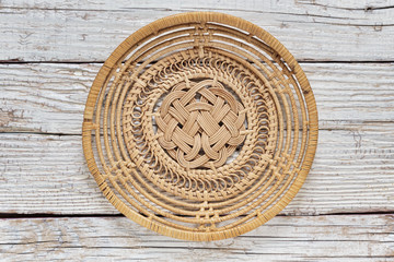Empty basket on an old wooden table