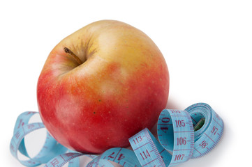 blue measure tape and red apple  isolated