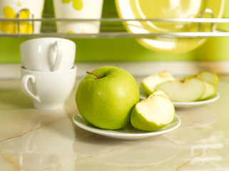 Apples on kitchen's table