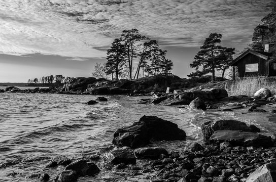 Shore of the baltic sea and the wooden cottage captured at Vuosaari area in Helsinki Finland 