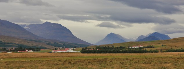Valley near Akureyri, Iceland. Rural landscape. Cloudy summer day.