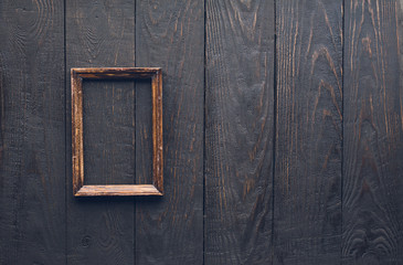 photo frame on old wooden wall