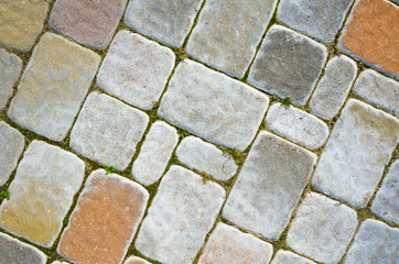 Multicolored Sidewalk Tile Texture. The Texture of Artificial Stone Pavers of Different Colors