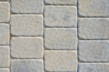 The Texture of the Gray Paving Stone from Artificial Stones. Gray Sidewalk Texture