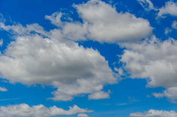 White clouds in deep blue sky
