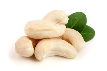 cashew nuts with leaf isolated on white background. macro