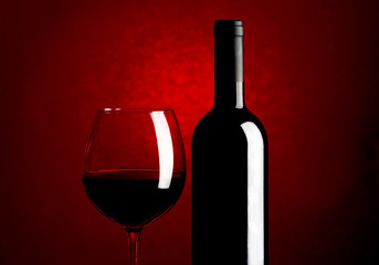Bottle and glass of red wine
