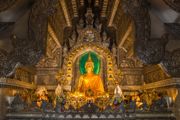 Golden Buddhism sculpture set in the silver temple Wat Srisuphan, Chiang Mai, Thailand