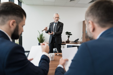 Two employees came to the director's office while he was playing golf. He screams at them.
