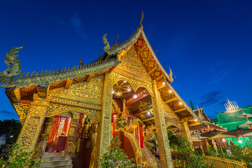 Wat Sri Suphan Buddhist temple magnificent contrast with the blue of the evening sky