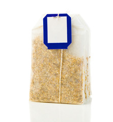 a bag of chamomile tea on a white background