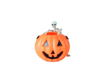 Halloween concept : Plastic human skeleton model  leaning against plastic Halloween Pumpkin buckets isolated on white background
