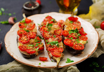 Baked eggplants with mozzarella and tomatoes with Italian herbs