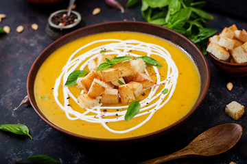 Cream of pumpkin soup with sour cream sauce