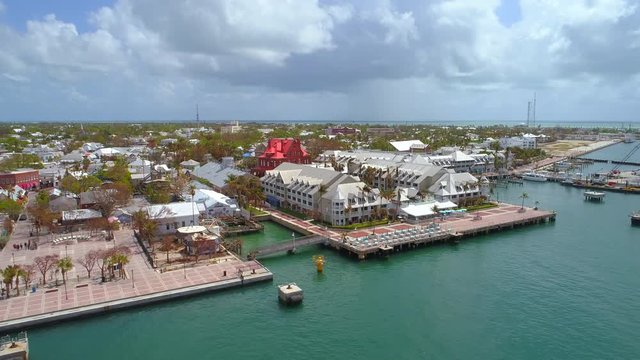 Aerial tour Mallory Square and resorts Key West FL 4k