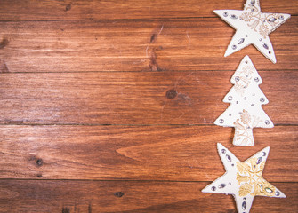 Fototapeta na wymiar Christmas background: christmas decoration on a wooden background