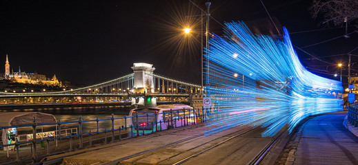 Fototapeta na wymiar Illuminated Yellow Tram in Budapest