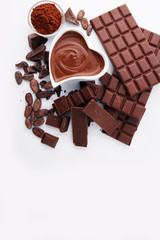 Melting chocolate or melted chocolate and chocolate swirl. stack and powder.