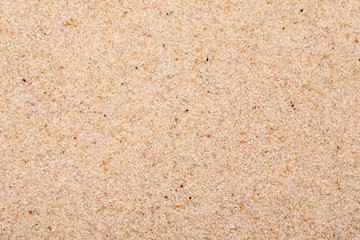 Light beach sand macro shot, abstract texture