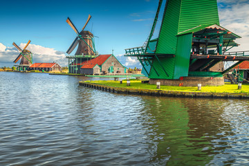 Fototapeta na wymiar Traditional Dutch windmills of Zaanse Schans, Zaandam, Netherlands, Europe