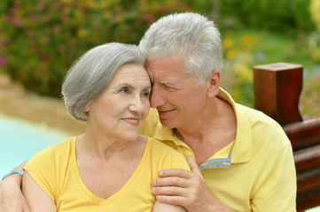  senior couple hugging 