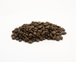  Isolated dark roasted coffee beans on white background