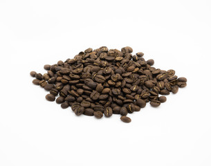 Isolated dark roasted coffee beans on white background