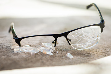 broken glasses on the asphalt - 175851286