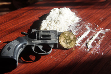 Obraz premium The white powder with a gun and money