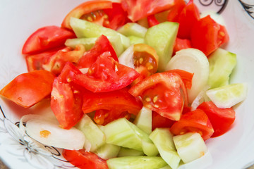 Tomato cucumber salad inside the trough / Azerbaijani salad