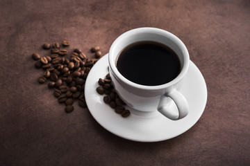 Aroma coffee cup with roasted beans