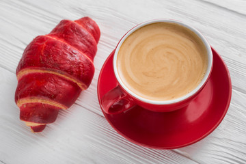 aroma coffee cup with croissant