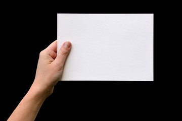 Female hands with clean sheet of paper