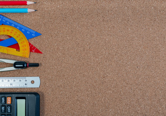 Stationery of education for mathematics class in school. Mathematics equipment and mathematics tools for basic math with calculator in the center.
