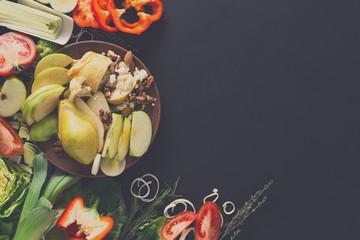 Frame of fresh vegetables on wooden background with copy space