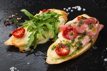 appetizer bruschetta with tomato and bacon