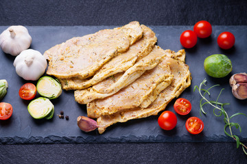 Vegetables and raw marinated pork meat 