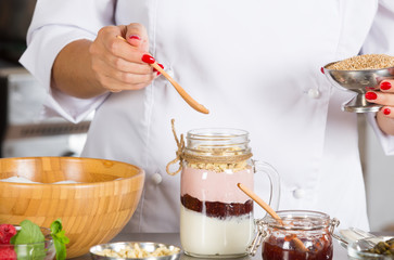 Cook making a dessert