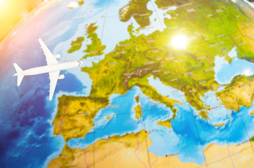 Flight to Europe symbolic image of travel by airplane map.